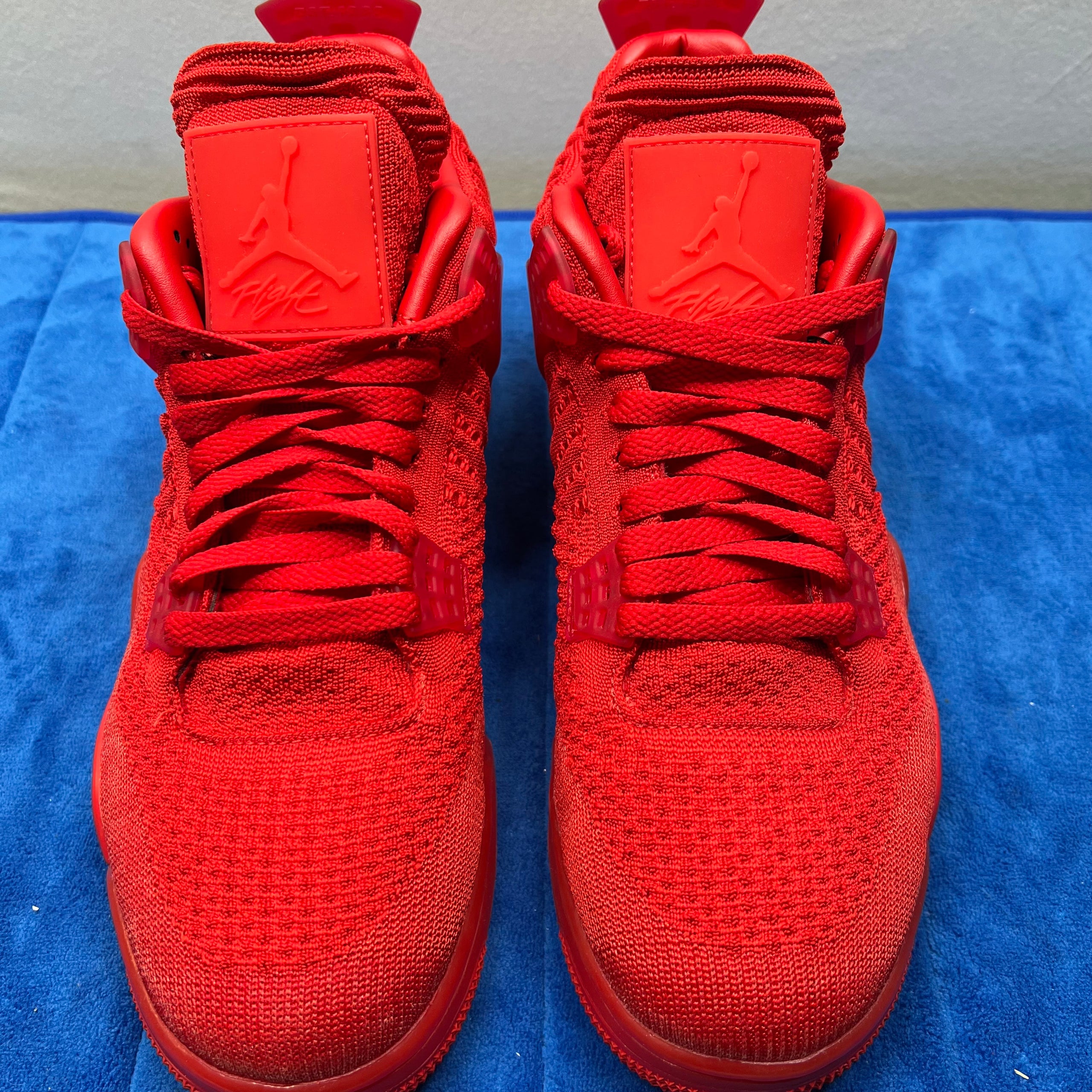 Jordan 4 flyknit red outlet